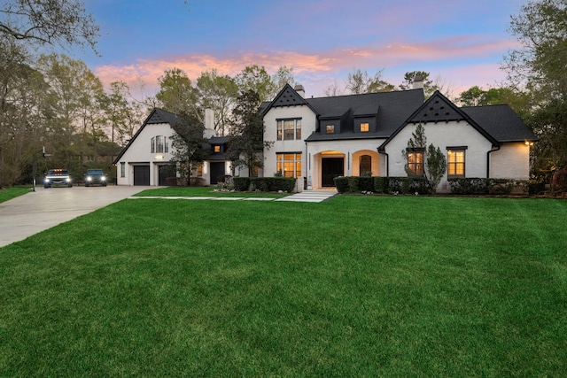 3702 Deerbend Ct, Spring, TX 77386 - french provincial home with a chimney, a yard, and concrete driveway