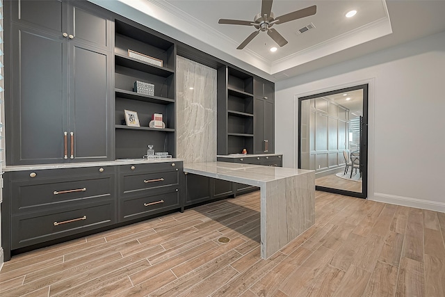 10615 Painted Crescent Ct, Cypress, TX 77433 - unfurnished office with light wood finished floors, ceiling fan, crown molding, baseboards, and a raised ceiling