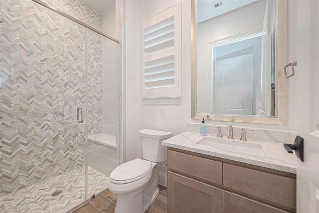10615 Painted Crescent Ct, Cypress, TX 77433 - bathroom featuring toilet, a shower stall, and vanity