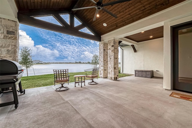 10615 Painted Crescent Ct, Cypress, TX 77433 - view of patio with a water view, ceiling fan, and a grill