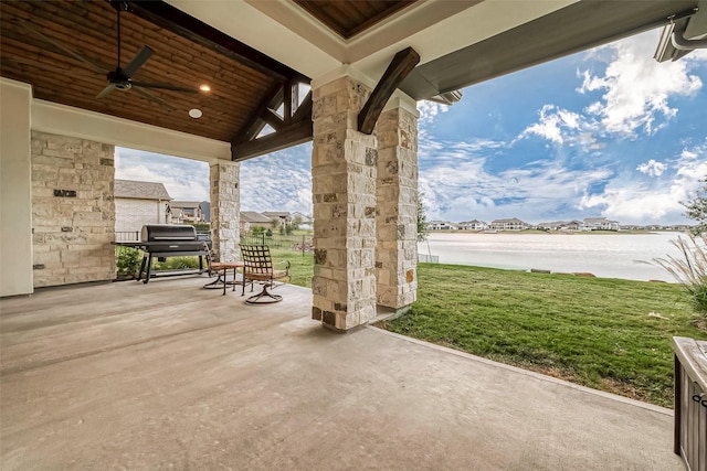 10615 Painted Crescent Ct, Cypress, TX 77433 - view of patio featuring a water view and a ceiling fan