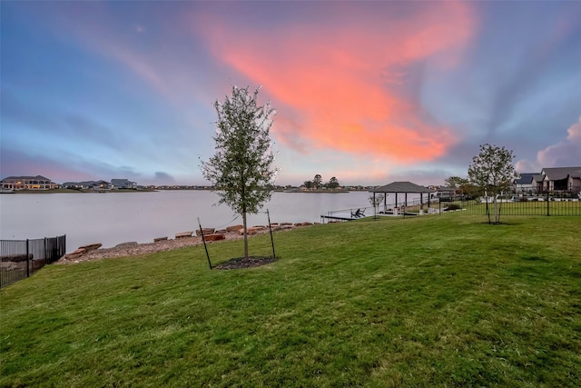 10615 Painted Crescent Ct, Cypress, TX 77433 - view of yard with a dock, a water view, and boat lift
