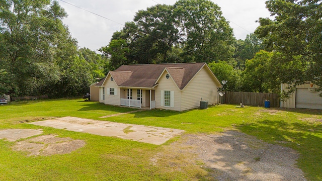 11664 Fm 92, Silsbee, TX 77656 - view of front of home featuring covered porch, cooling unit, and an outdoor structure