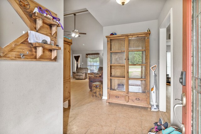 11664 Fm 92, Silsbee, TX 77656 - hall featuring light tile patterned floors and lofted ceiling