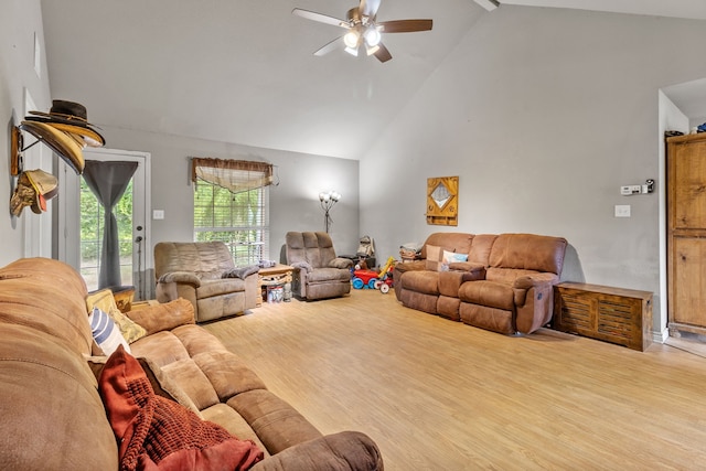 11664 Fm 92, Silsbee, TX 77656 - living room featuring wood finished floors, ceiling fan, high vaulted ceiling, and beamed ceiling