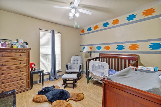 11664 Fm 92, Silsbee, TX 77656 - bedroom featuring light wood-style floors and a ceiling fan