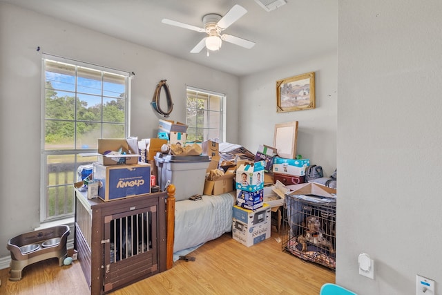 11664 Fm 92, Silsbee, TX 77656 - bedroom featuring wood finished floors and ceiling fan