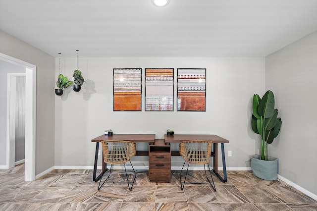 234 Willowbend St, Huntsville, TX 77320 - dining space with baseboards and an office area