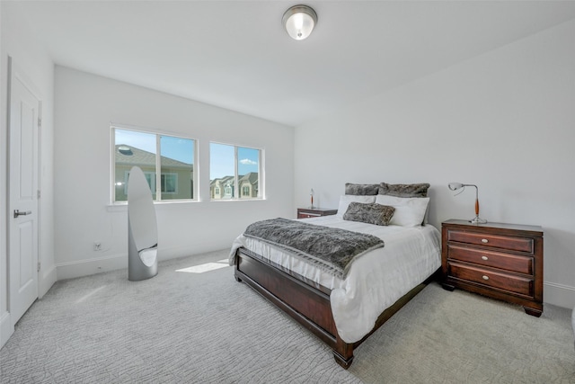 11015 Ayrshire Park Ln, Houston, TX 77043 - bedroom with carpet floors and baseboards
