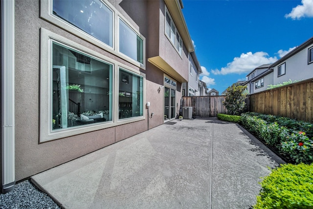 11015 Ayrshire Park Ln, Houston, TX 77043 - fenced backyard with a patio area and central AC