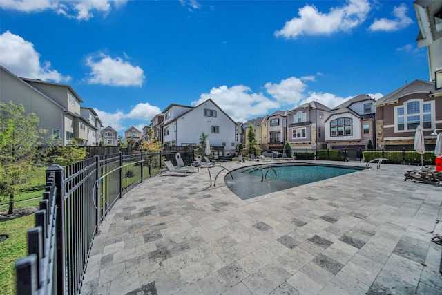 11015 Ayrshire Park Ln, Houston, TX 77043 - community pool with a residential view and a patio area