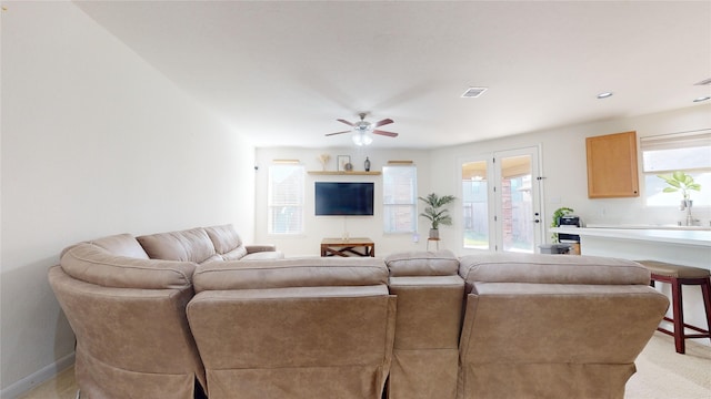 2702 Skyview Moon Dr, Houston, TX 77047 - living room with healthy amount of natural light and ceiling fan