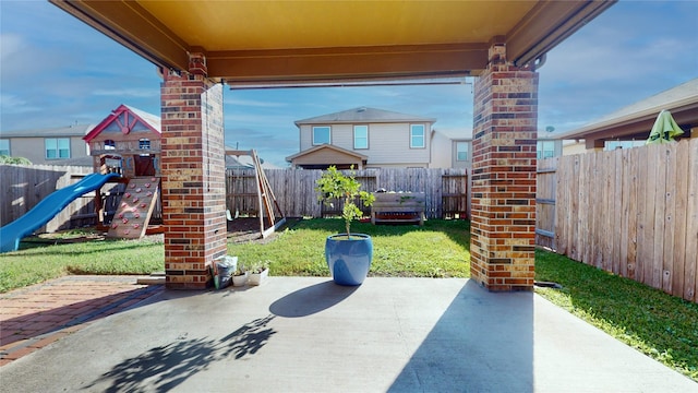 2702 Skyview Moon Dr, Houston, TX 77047 - view of patio with a playground
