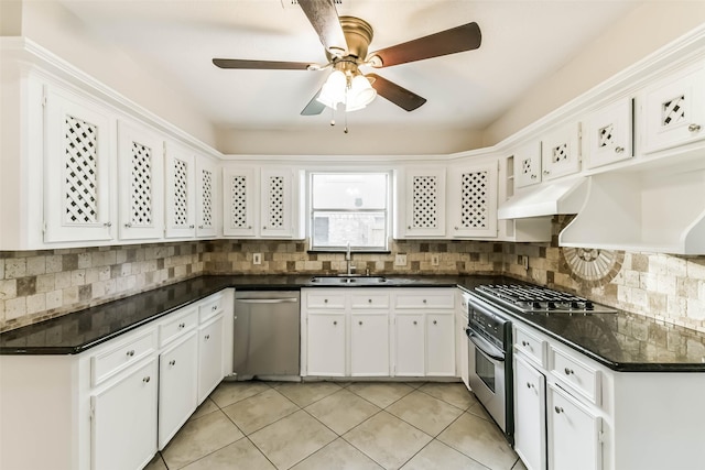 14922 Walters Rd, Houston, TX 77068 - kitchen with stainless steel appliances, a sink, dark countertops, and backsplash