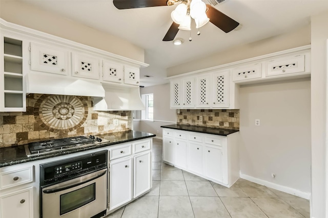 14922 Walters Rd, Houston, TX 77068 - kitchen featuring appliances with stainless steel finishes, white cabinetry, tasteful backsplash, and light tile patterned floors