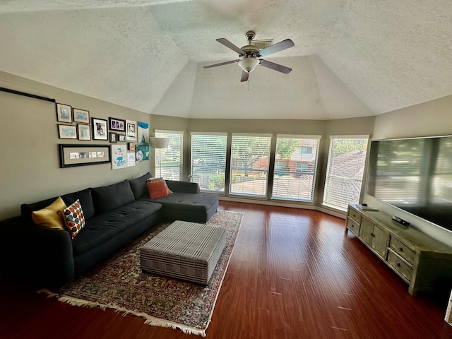 19203 Yearling Mdws, Houston, TX 77094 - living room featuring vaulted ceiling, a textured ceiling, ceiling fan, plenty of natural light, and wood finished floors