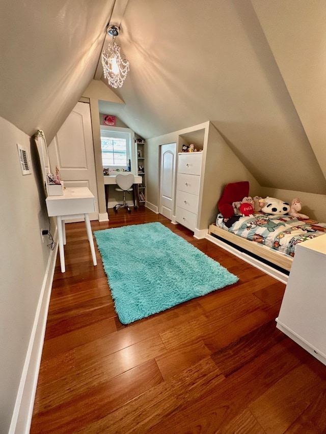 19203 Yearling Mdws, Houston, TX 77094 - bedroom featuring wood finished floors, baseboards, and lofted ceiling
