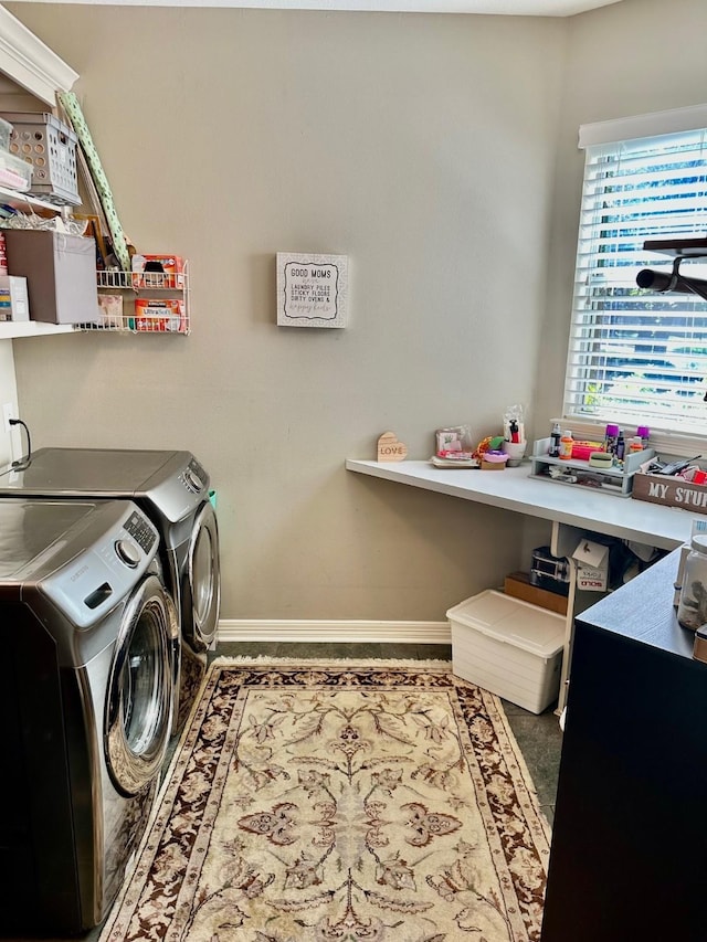 19203 Yearling Mdws, Houston, TX 77094 - laundry area with independent washer and dryer and baseboards