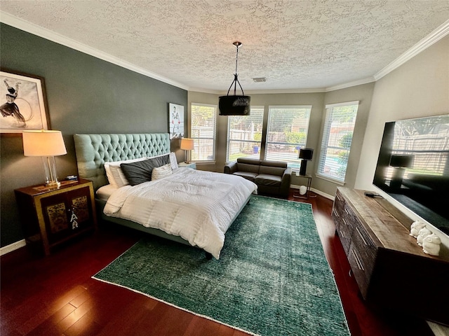 19203 Yearling Mdws, Houston, TX 77094 - bedroom with wood finished floors, crown molding, a textured ceiling, and baseboards