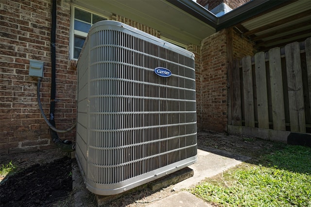 1191 Barnum Blvd, Corrigan, TX 75939 - exterior view of central air condition unit and brick siding
