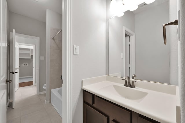 31766 Chapel Rock Ln, Spring, TX 77386 - bathroom featuring tile patterned flooring, vanity, and tub / shower combination