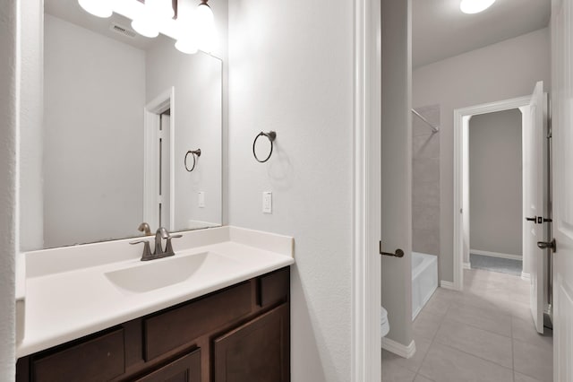 31766 Chapel Rock Ln, Spring, TX 77386 - full bathroom featuring vanity, toilet, tile patterned flooring, and tub / shower combination