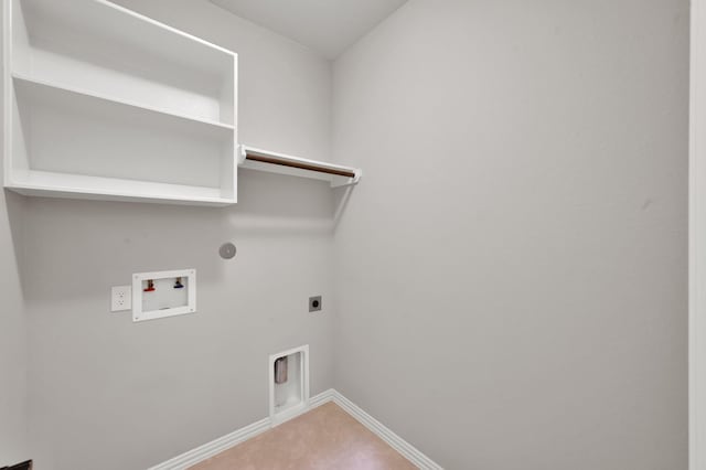 31766 Chapel Rock Ln, Spring, TX 77386 - laundry area featuring hookup for an electric dryer, washer hookup, baseboards, and hookup for a gas dryer