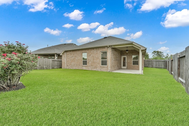 31766 Chapel Rock Ln, Spring, TX 77386 - rear view of house featuring a patio, a ceiling fan, and brick siding