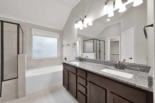 31766 Chapel Rock Ln, Spring, TX 77386 - full bath with lofted ceiling, a stall shower, a garden tub, double vanity, and crown molding