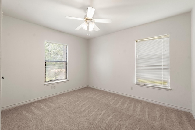 185 Rustic Way, Livingston, TX 77351 - carpeted spare room with baseboards and ceiling fan