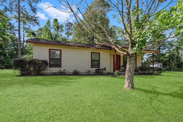 185 Rustic Way, Livingston, TX 77351 - single story home with a front lawn