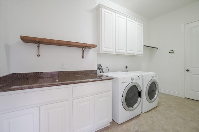 18011 Stari Most Ln, Houston, TX 77044 - laundry room featuring cabinet space and washing machine and dryer