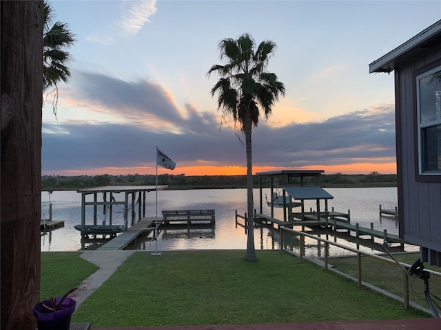 142 Seagull, Sargent, TX 77414 - dock featuring boat lift, a water view, and a lawn