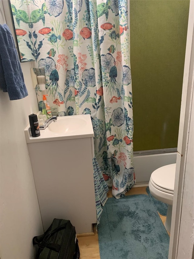 142 Seagull, Sargent, TX 77414 - bathroom with toilet, vanity, and shower / tub combo