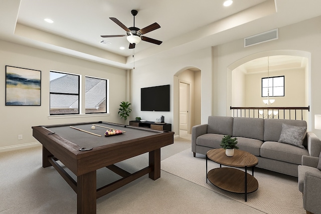 32 Evangeline Blvd, Conroe, TX 77304 - game room with a tray ceiling, light carpet, ceiling fan, arched walkways, and recessed lighting