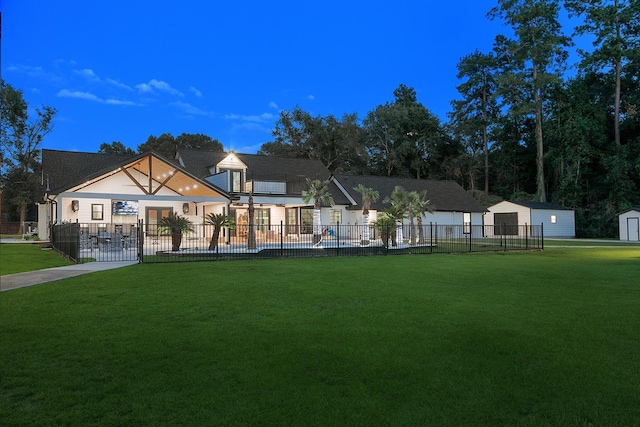 15232 Saddlewood Dr, Conroe, TX 77384 - view of front of house with an outbuilding, a storage unit, and a garage