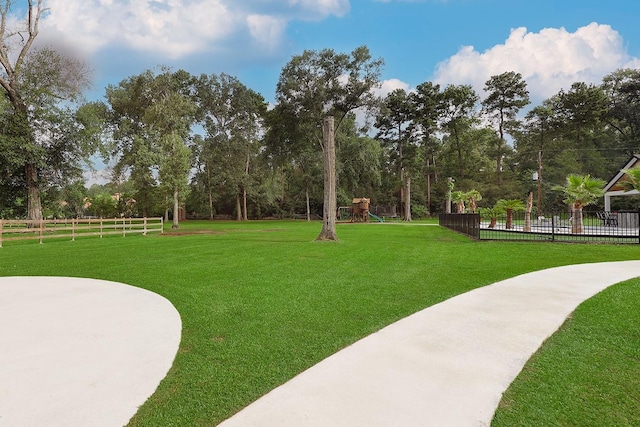 15232 Saddlewood Dr, Conroe, TX 77384 - view of yard with view of wooded area