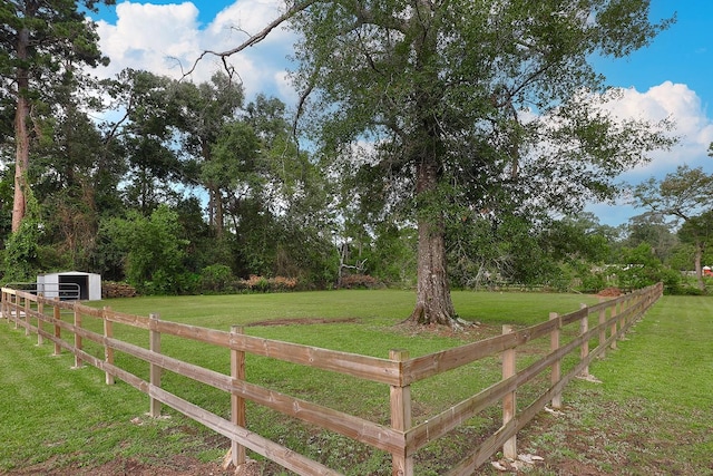 15232 Saddlewood Dr, Conroe, TX 77384 - view of yard featuring an outdoor structure