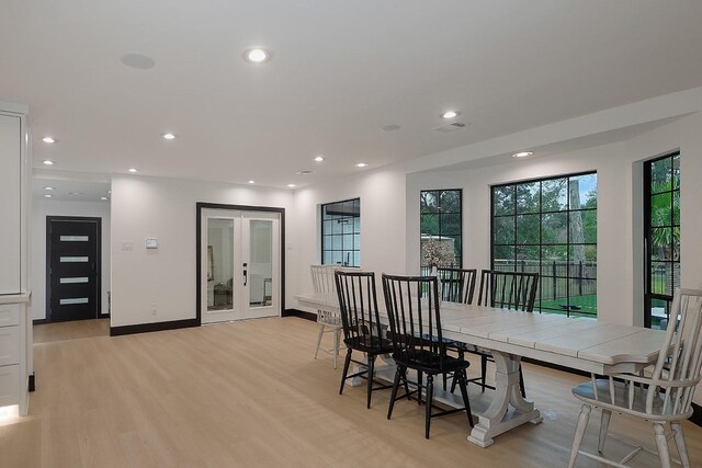 15232 Saddlewood Dr, Conroe, TX 77384 - dining room featuring light wood finished floors, recessed lighting, and baseboards