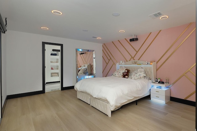 15232 Saddlewood Dr, Conroe, TX 77384 - bedroom featuring light wood-type flooring, baseboards, and recessed lighting