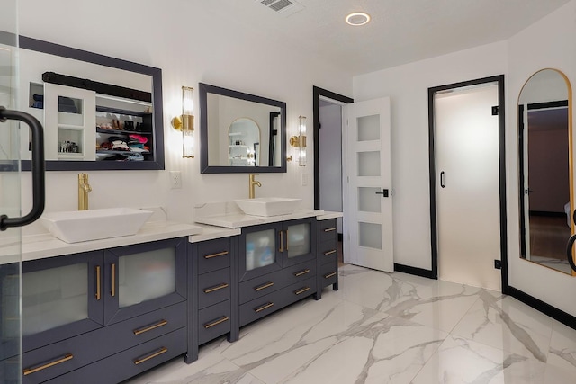 15232 Saddlewood Dr, Conroe, TX 77384 - full bathroom with marble look tiles and double vanity