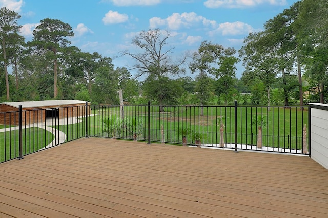 15232 Saddlewood Dr, Conroe, TX 77384 - deck featuring a yard and view of scattered trees