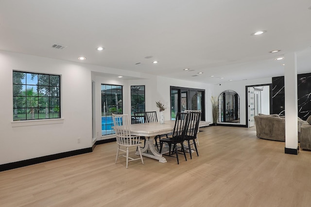 15232 Saddlewood Dr, Conroe, TX 77384 - dining room featuring light wood-style flooring, recessed lighting, and baseboards