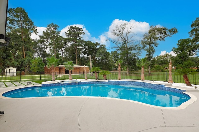 15232 Saddlewood Dr, Conroe, TX 77384 - view of pool featuring a patio area, an outdoor hot tub, and view of wooded area