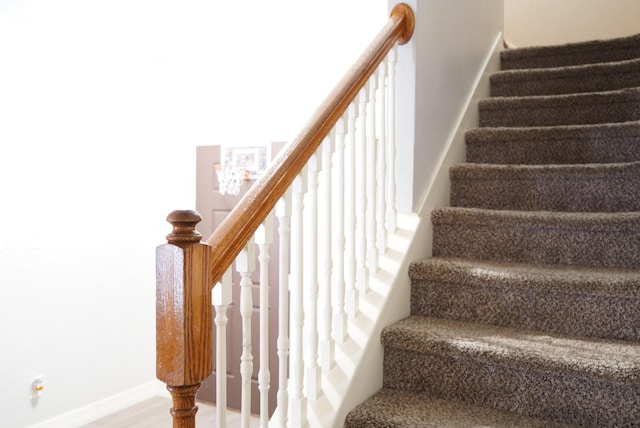 16019 Summerville Lake Dr, Tomball, TX 77377 - stairs with wood finished floors and baseboards