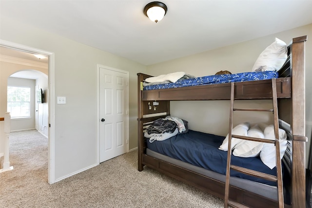 17006 Valley Palms Dr, Spring, TX 77379 - carpeted bedroom with arched walkways and baseboards