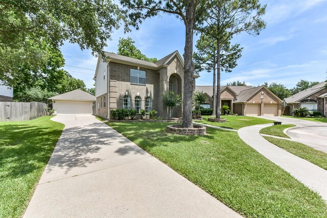 17006 Valley Palms Dr, Spring, TX 77379 - traditional-style home with brick siding and a garage