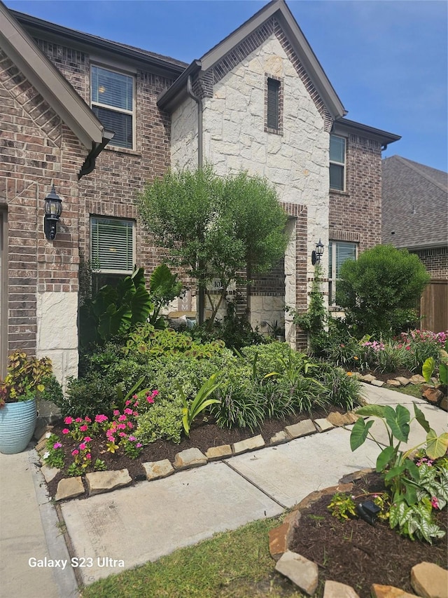 1013 Goose Creek St, Webster, TX 77598 - doorway to property with stone siding and brick siding