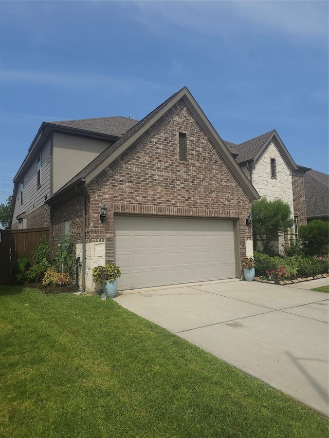 1013 Goose Creek St, Webster, TX 77598 - view of home's exterior featuring brick siding, concrete driveway, an attached garage, and a shingled roof