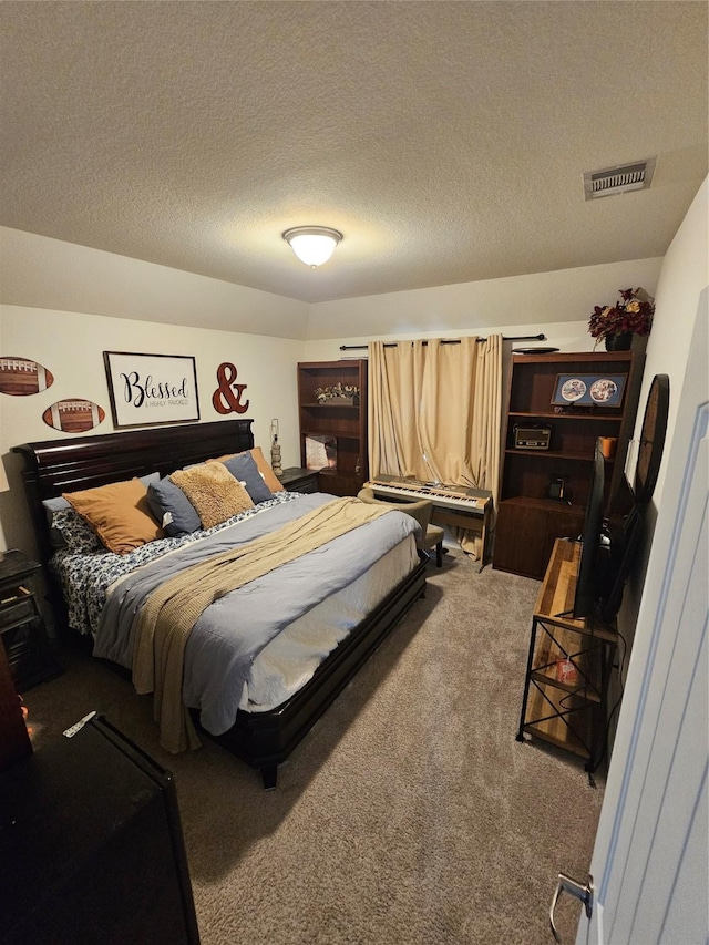1013 Goose Creek St, Webster, TX 77598 - bedroom featuring carpet floors and a textured ceiling